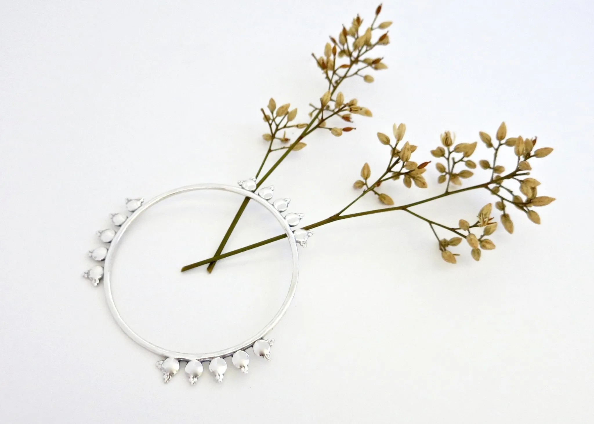 ABIOLA dots and granulation bangle
