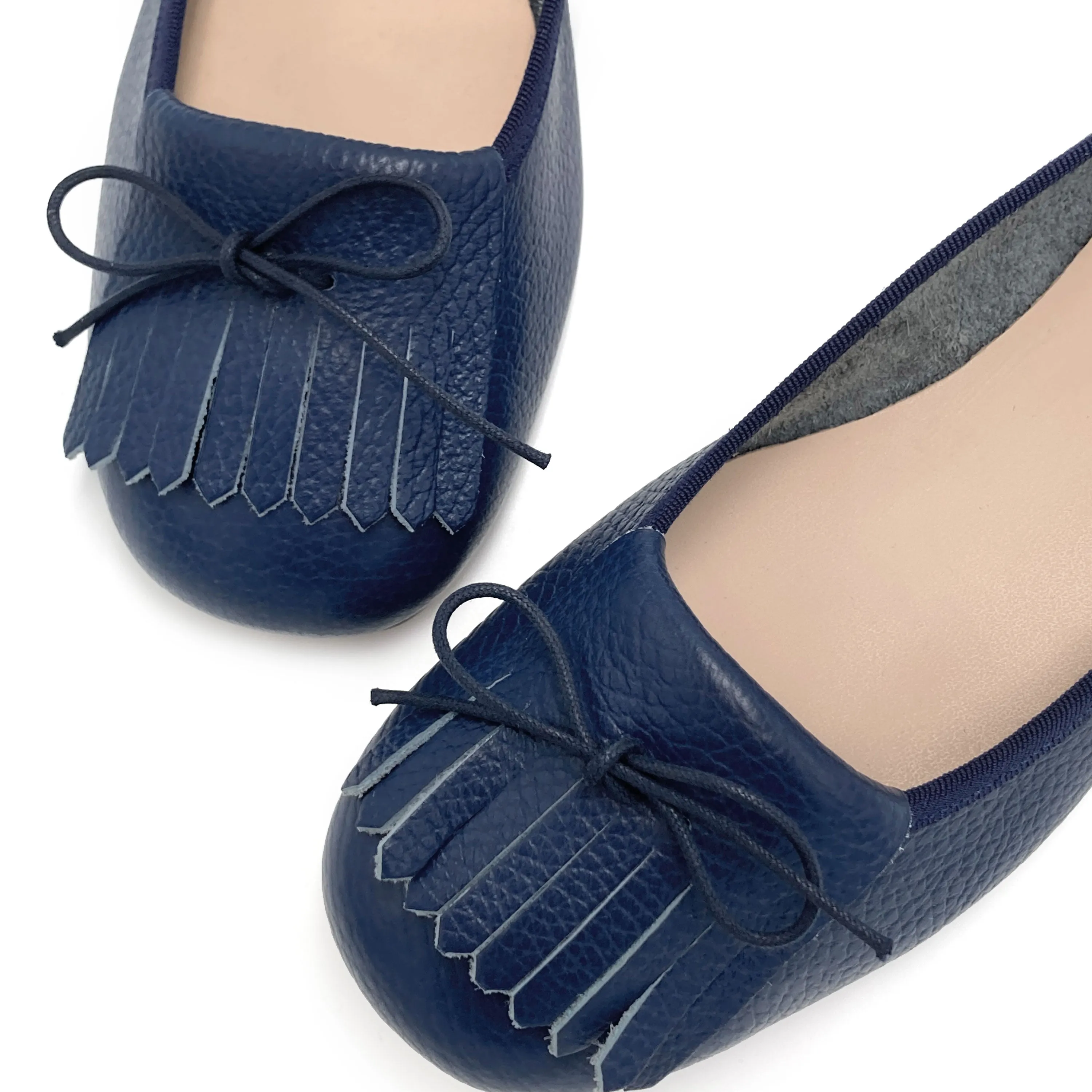Blue leather moccasins with fringe