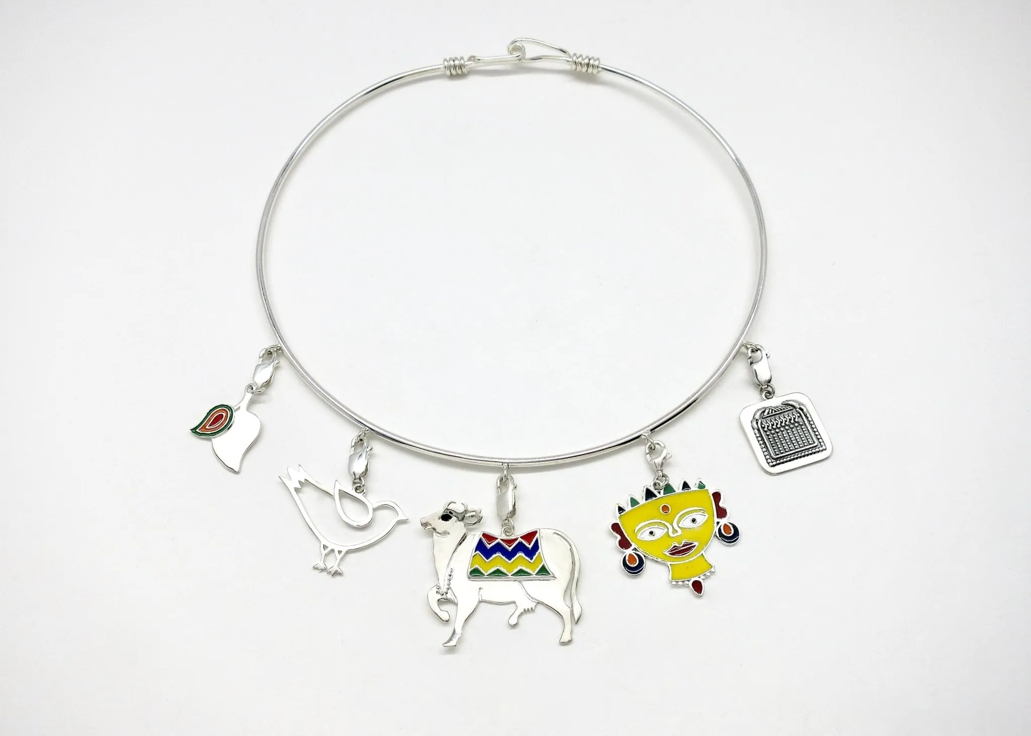 Charm neck-ring ('hasli')