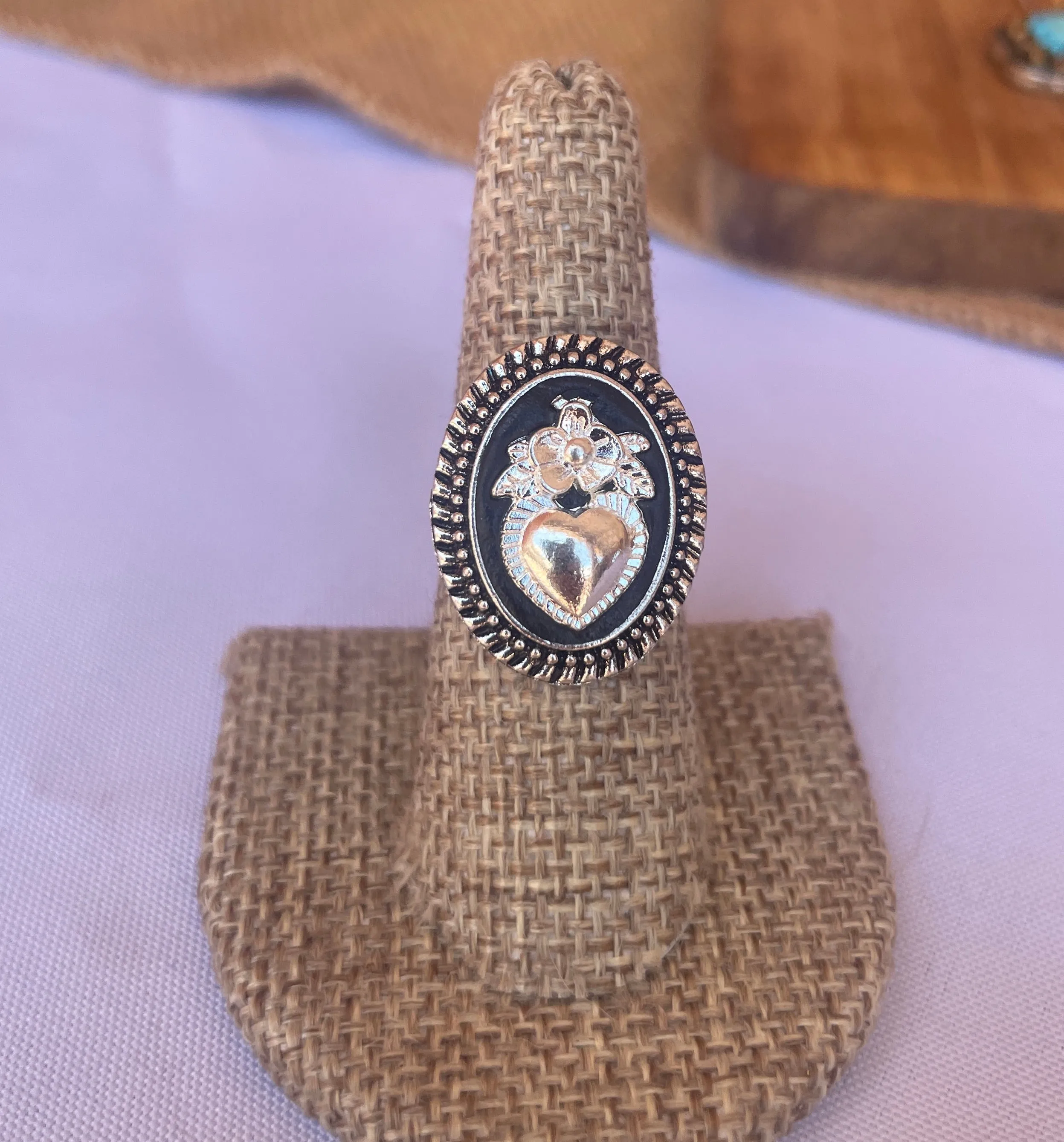 Oval ring with sacred heart