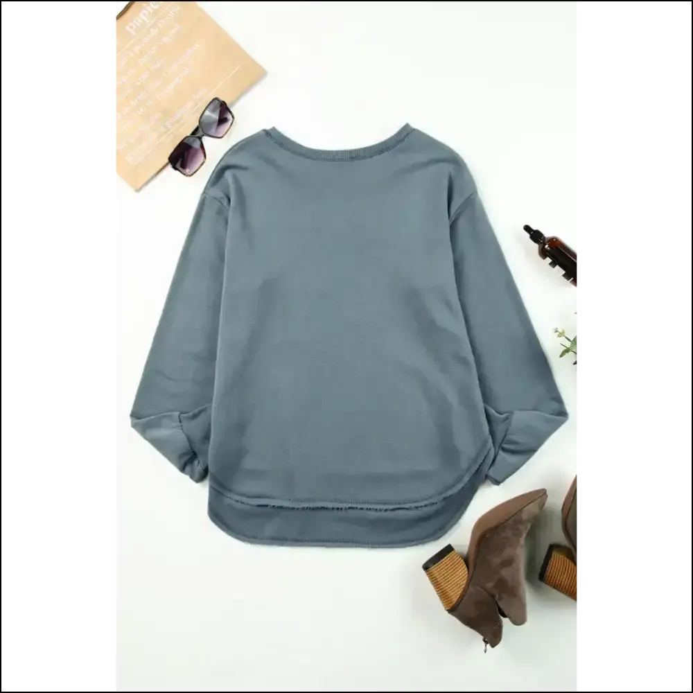 Slay All Day in our Chic Slit Drop Shoulder Sweatshirt! 🔥 Needful Things